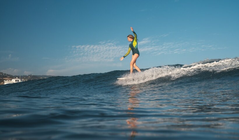 woman surfing