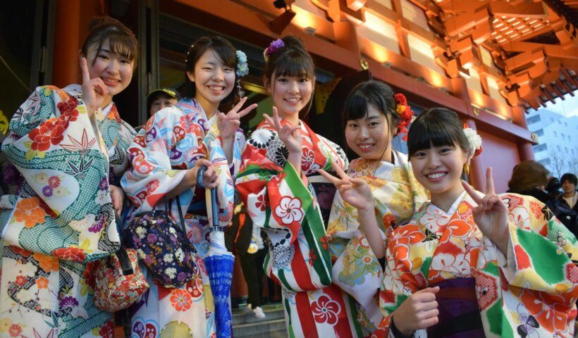 five women wearing oriental dresses